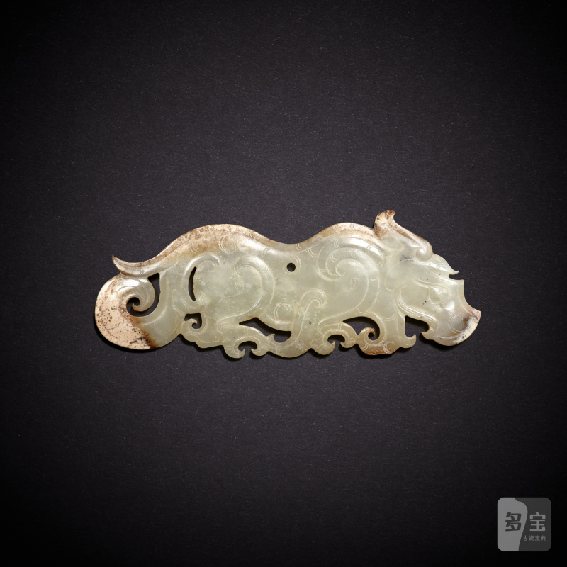 A white jade 'tiger' pendant, Han dynasty | 漢 白玉虎紋珮